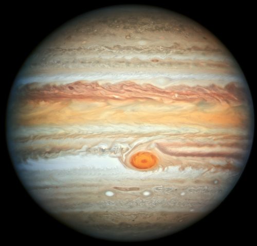 Jupiter with its cream and rust cloud bands and the Great Red Spot