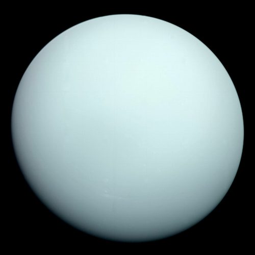 Uranus, a featureless pale cyan globe