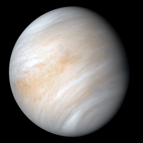 Venus wrapped in pale cream and tan clouds